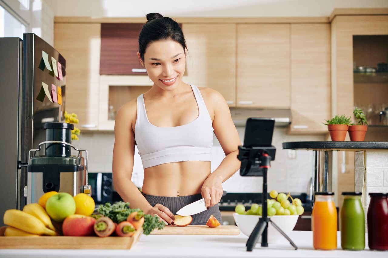 woman recording cooking video.jpg